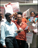 Strikers rally outside the Ministry of Health in Colombo, photo by CWI