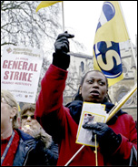 PCS strike on budget day, 20 March 2013 with NSSN 24 hour general strike placard , photo by Paul Mattsson