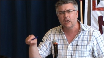 Terry Kelleher, CPSU Executive, Ireland, condemns the cuts at the National Shop Stewards Network conference 2010, photo Socialist Party Terry Kelleher, CPSU Executive, Ireland, condemns the cuts at the National Shop Stewards Network conference 2010, photo Socialist Party
