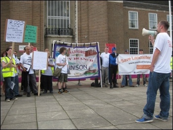 Steve North addressing a rally against the closure of Lancaster House, Salford, photo Hugh Caffrey