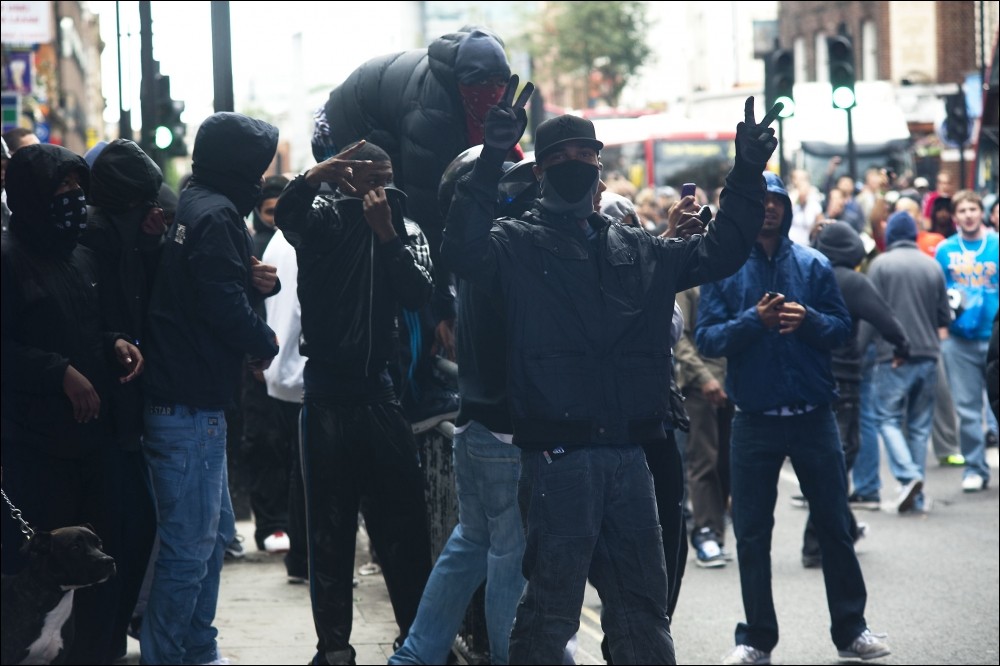 Riots: rioters and police in Hackney during August 2011 disturbances