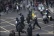 Riots: rioters and police in Hackney during August 2011 disturbances