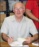 Peter Taaffe, Socialist Party geneal secretary, signs copies of his book