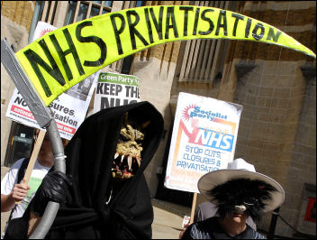 The Socialist Party's 'Grim Reaper' joins the Keep Our NHS Public 'Defend our health service' protest outside the Department of Health on the 60th anniversary of the founding of the health service, photo Paul Mattsson