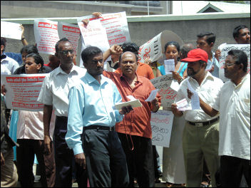 Strikers rally outside the Ministry of Health in Colombo, photo by CWI