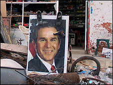 Shoes are commonly pressed against pictures of US President George W Bush in the Middle East, considered a serious insult