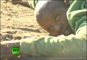 Mine workers hits the ground as firing starts - Russia Today video still, photo RT