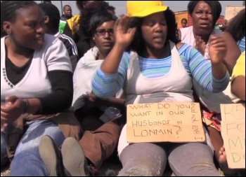 Striking mine workers' wives join the protest in Marikana