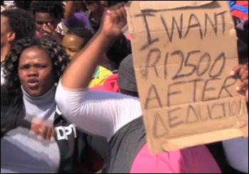 Striking mine workers' wives join the protest in Marikana