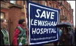 Saturday 24 November, defying cold driving rain, up to 10,000 residents and staff marched to defend Lewisham Accident and Emergency (A&E) and linked arms around it., photo Socialist Party