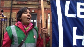 Saturday 24 November, defying cold driving rain, up to 10,000 residents and staff marched to defend Lewisham Accident and Emergency (A&E) and linked arms around it., photo Socialist Party