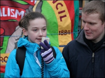 Hannah Mainstone speaking on the Cardiff Against the Cuts protest (with Ross Saunders), photo by Becky Davis
