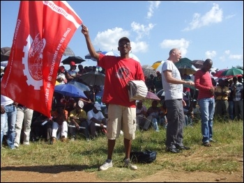 Flying the CWI flag; Alec Thraves on the right of the flag holder; South Africa February 2013, photo by DSM