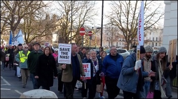 Saturday 6 April saw around 300 people march through the centre of Cheltenham, Gloucestershire, against plans to reduce night time staffing at the town's A&E. , photo by Chris Moore Saturday 6 April saw around 300 people march through the centre of Cheltenham, Gloucestershire, against plans to reduce night time staffing at the town's A&E. , photo by Chris Moore