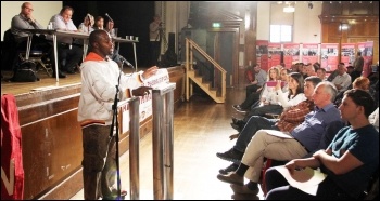 Michael Ologun, Unite shop steward from  Equinox Care, speaking at NSSN conference, 29.6.13 , photo Senan