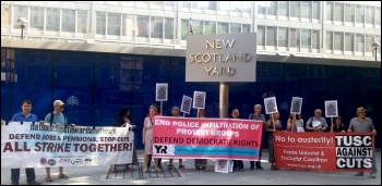 Protesting outside Scotland Yard, 9.7.13, photo N Cafferky