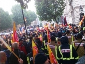 Massing outside the gates of Downing Street, 16.10.13, photo Mick Cotter