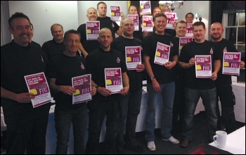 Surrey FBU area reps prepare for the 'save our fire service' march on 7 December