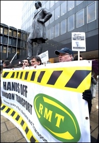 RMT members protesting outside London's Euston station, photo Paul Mattsson