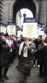 Glasgow residential care workers striking against pay cuts of up to £1,500 a year, photo by Socialist Party Scotland