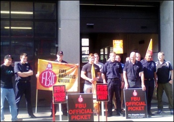 Nottingham firefighters on strike, 12.6.14. Nottinghamshire Fire Authority is planning £2.4 million worth of cuts. photo by Becci Heagney