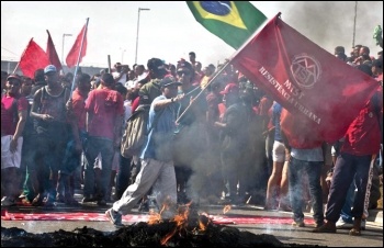 MTST homeless workers' movement activists stage a protest during the World Cup