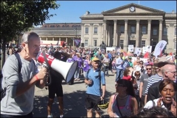 Mike Forster leading some chanting and singing in Huddersfield on July 10th