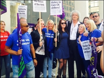 Queen guitarist Brian May stops to give his support to Care UK strikers at their protest outside Bridgepoint private equity, photo by Lenny Shail