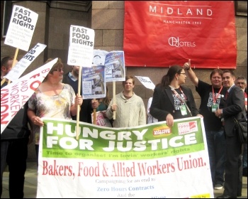 Fast Food Rights supporters, spearheaded by BFAWU bakers' union, demonstrate outside Labour's national conference in Manchester demanding and end to zero-hour contracts and a universal £10 minimum wage, 15 September 2014 , photo Hugh Caffrey