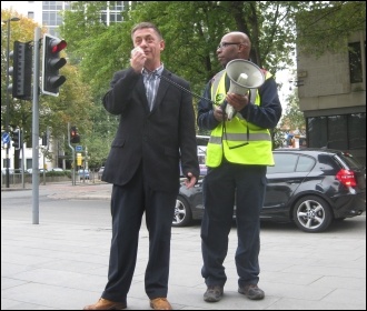 PCS assistant general secretary Chris Baugh addressing today's PCS strike rally in Manchester, 15.10.14, photo by Hugh Caffrey