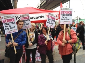 Collecting NSSN placards on the Embankment, TUC demo 18.10.14, photo by JB