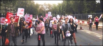 Fast Food Rights protesters head for McDonalds, photo Helen Pattison