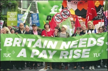 The TUC banner at the front of the 18 October 2014 demo, followed by the Unite Housing Workers branch, photo Paul Mattsson