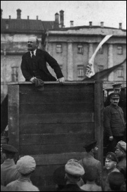 Lenin speaking at a 1920 demonstration, flanked by Trotsky