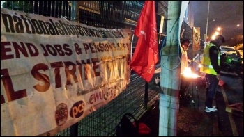 NSSN banner at West Ham garage, Unite London bus strike, 13.1.15, photo by Rob Williams