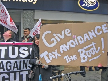 Leicester TUSC supporters protesting outside Boots over tax avoidance, photo by Leicester SP