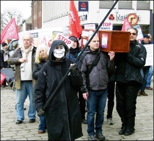A 'die' in was held outside Chesterfield Jobcentre as part of a Unite Community national day of action agianst benefit refusals and sanctions, 19.03.15 , photo by Elaine Evans