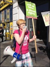 Helen Pattison, Youth Fight for Jobs, addressing protesters outside McDonalds, Marble Arch, London, 15.4.15, photo Judy Beishon