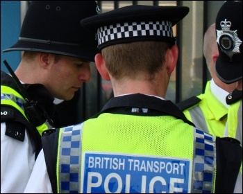 Police on the London Underground, photo JD Mack (Creative Commons)