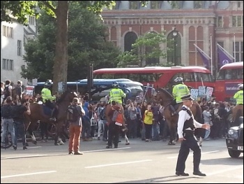 Young people block the road, 8.7.15, photo by Nancy Taaffe
