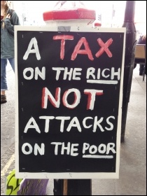 A placard on the People's Assembly anti-austerity demo, 20.6.15, photo Judy Beishon
