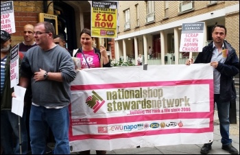 NSSN banner at a protest outside Pizza Express (NSSN chair Rob Williams on the right). September 2015 