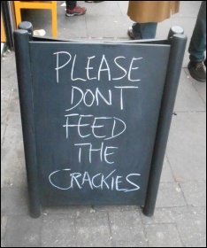 'Please don't feed the crackies' sign outside Brick Lane Coffee, photo Twitter 'Please don't feed the crackies' sign outside Brick Lane Coffee, photo Twitter