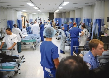 Health workers, photo by Wikimedia Commons (Creative Commons)