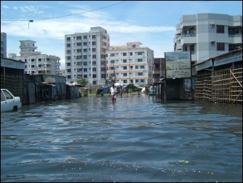 Flooding in Bangladesh, photo by dougsyme (Creative Commons)