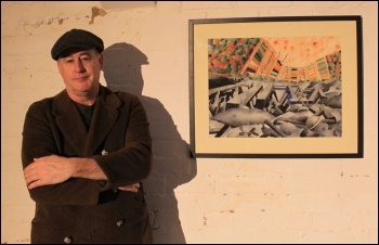 Bradford artist and Socialist Party member Peter Robson with some of his work, photo Bradford Socialist Party