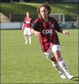 Young woman playing football, photo by James Boyes (Creative Commons) Young woman playing football, photo by James Boyes (Creative Commons)