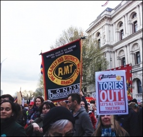 Piccadilly & District West RMT banner on the BMA-NUT led march, London, 26.4.16, photo by Judy Beishon