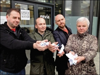 Campaigning against Ireland's water levy outside Irish Water, with Paul Murphy TD (second from left), photo by Socialist Party (CWI Ireland)