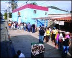 Queing for basics outside a government run store in Venezuela photo Creative Commons, photo Creative Commons